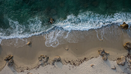 Wave Action and Rocky Shoreline – Aerial View of Coastal Texture in Calabria, Italy