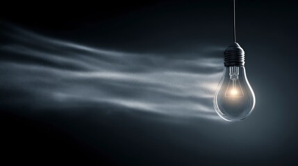 Glowing lightbulb idea symbol