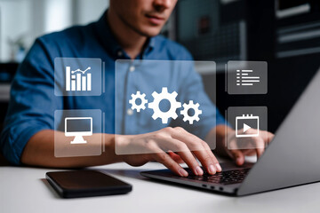 businessman working on laptop. Man on Laptop with Productivity Tech Icons