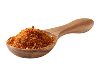 A wooden spoon holds a generous helping of vibrant red spice blend perfect for enhancing any dish