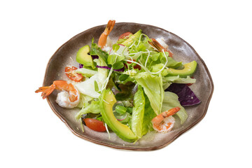 Freshness on a Plate: A vibrant salad, featuring succulent shrimp, creamy avocado, and crisp...