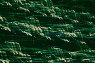 Swirling lights create an ethereal dance in a darkened space