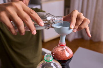 A Young Scientist Conducting a Home Experiment with Proper Safety Gear for Protection