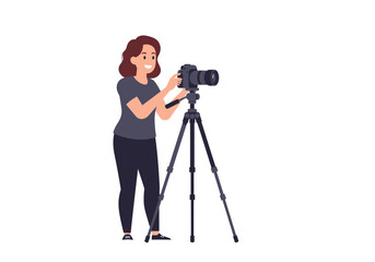 Smiling woman adjusts a camera mounted on a tripod