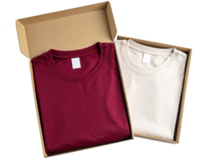 Two folded t shirts in a cardboard box isolated on transparent background