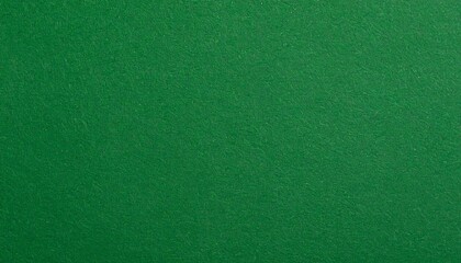 Fototapeta premium A solid green textured surface resembling felt fills the frame—evoking freshness, simplicity, and tactile calm through a minimal color and material study.