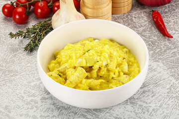 Italian cuisine - yellow risotto with chicken