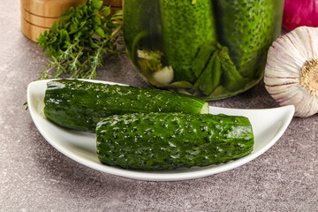 Homemade lighty salted cucumbers with herbs