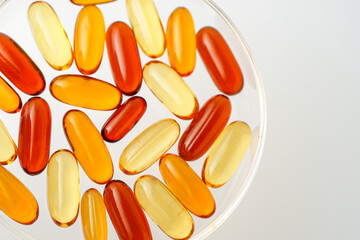 Vitamins capsules, fish oil, soft gels, supplements, omega 3, omega 9, vitamin D, vitamin E