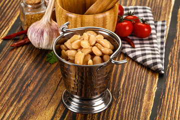 Baked white canned beans in the bowl