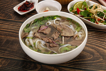Vietnamese Pho Bo soup with beef and noodles