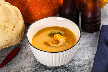 Pumpkin cream soup with prawns