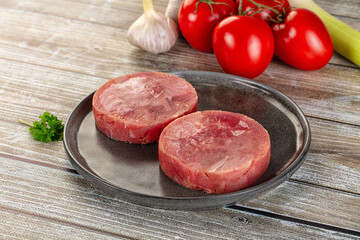 Raw round tuna fish fillet