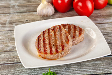 Grilled tuna steak fillet medallion