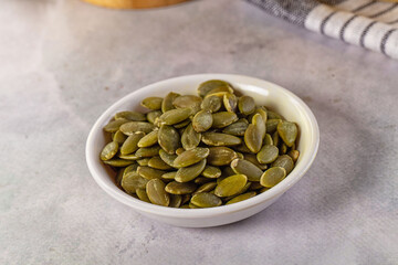 Fresh green pumpkin peeled seeds