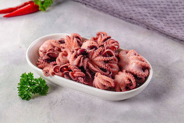 Marinated canned mini baby octopus