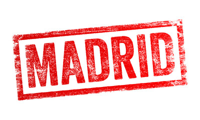 Stamped text with a distressed texture that reads - MADRID in all capital letters, resembling a passport or travel stamp