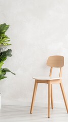 Modern Wooden Chair and Lush Houseplant in a Serene Minimalist Interior, Perfect for Contemporary Home Decor and Design Inspiration