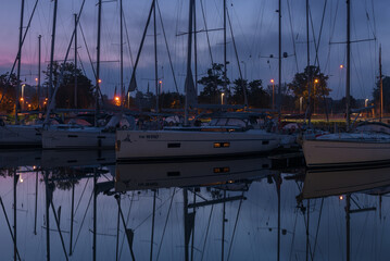 KOLOBRZEG, WEST POMERANIAN - POLAND - JULY 20, 2025: Sunrise over the yachts in the marina
