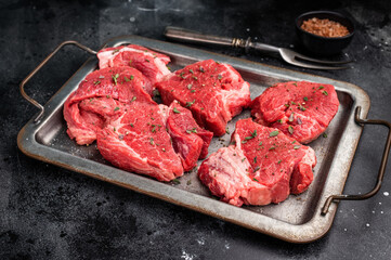 Raw beef boneless shank shin meat with herbs and spices ready for cooking. isolated on white background. top view