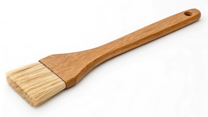 A wooden basting brush for cooking isolated on white background