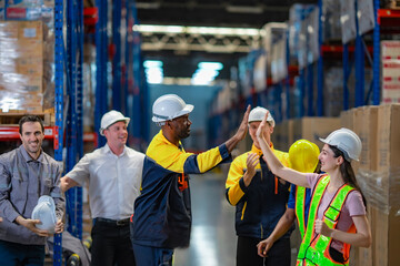 Inclusive logistics team standing in aisle. Represents strong corporate culture, safety, and collaboration.