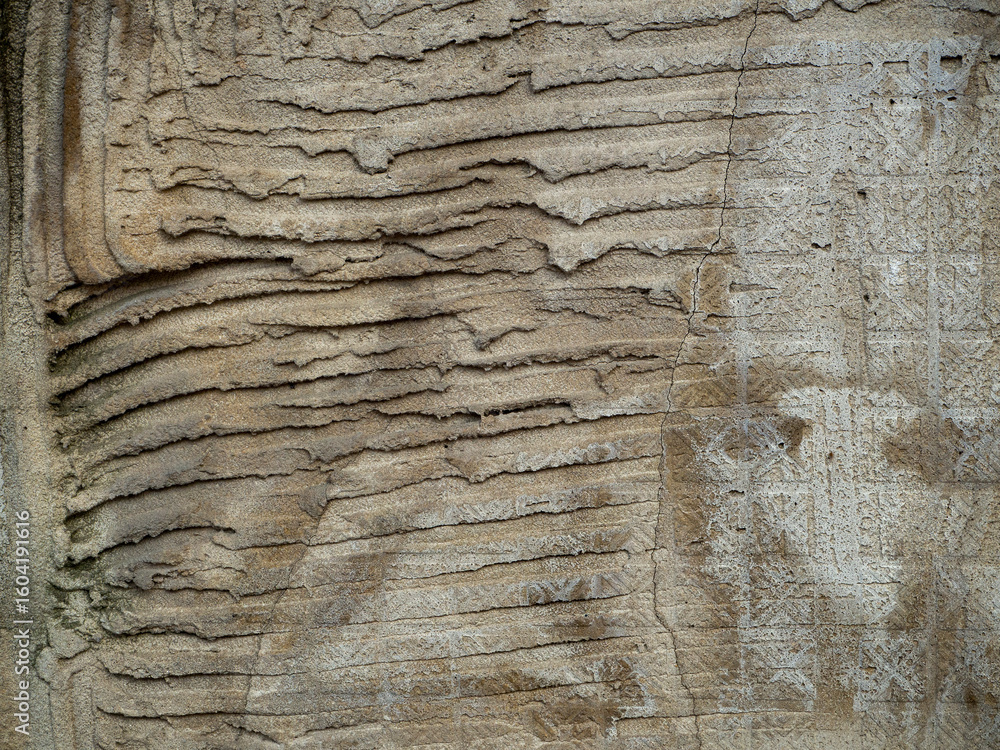 Poster abstract stone background of old rough plaster. stripes are visible on the surface - grooves and imp