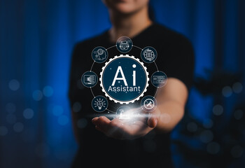 AI Virtual Assistant and Automation Technology Concept. Person holding AI Assistant icons with artificial intelligence, automation, machine learning, AI agent, service, digital smart support systems.