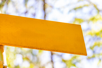 Yellow arrow location and hiking sign direction in Tyrol Austria.