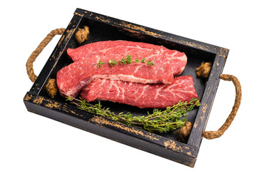 Raw skirt or machete  Steak, beef meat in wooden tray with herbs isolated on white background