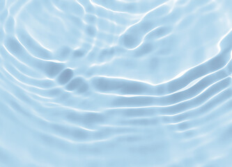 Abstract blurred shades of blue water background. Light and shadow ripples or splashes surface of water texture. Water waves with shining and reflection pattern photography for​ design artwork.