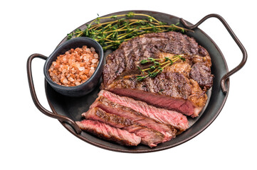 Grilled Rib eye steak with herbs in a tray, roast prime beef meat isolated on white background
