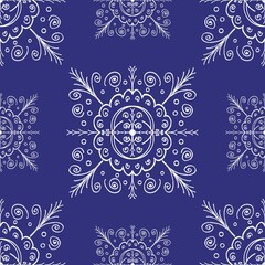 Exquisite floral native fabric pattern on a blue background: Beautiful, elegant and seamless white floral pattern dances gracefully on a dark blue background.