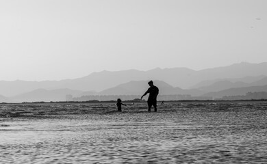  A collection of serene and atmospheric seascape photos from a Korean beach at dusk.

