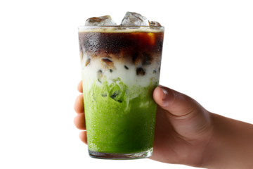  A hand holding a glass of iced matcha espresso latte, with separated green tea, milk and coffee layers. Visible ice cubes. isolated on transparent background with clipping path