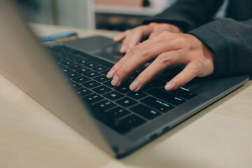 Entrepreneur Asian businessman and businesswoman discussing new business project in tablet in...