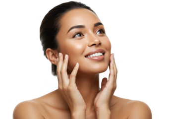 A beautiful woman with perfect skin is smiling and looking up while touching her