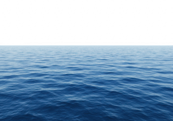 A vast expanse of the deep blue ocean stretches out to the horizon under a clear sky