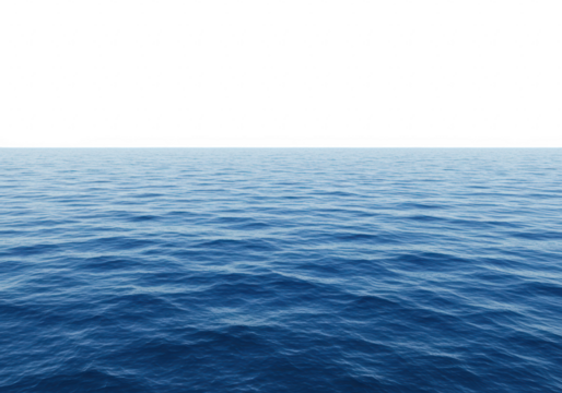 A vast expanse of the deep blue ocean stretches out to the horizon under a clear sky