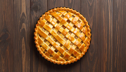 Deliciously baked apple pie with a golden crust on wooden table. Perfect dessert for any gathering or celebration.