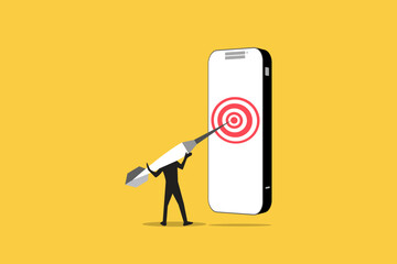 Businessman hitting Darts target on smartphone display. concept of success, achieving goals and in the direction and development of a company, startup or mobile App