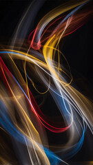Displays colorful, swirling light trails against a dark background, creating an abstract and dynamic effect