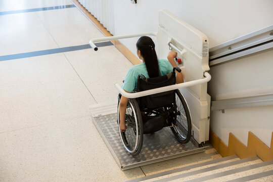 Disability stairs lift facility indoor building Wheelchair elevator.
