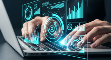 Close up of hands typing on a laptop with futuristic glowing data visualizations