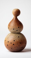 Ceramic figure, two rounded forms, speckled, muted tones