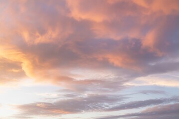 Fototapeta premium Sky with peach and lavender clouds sunset sunrise