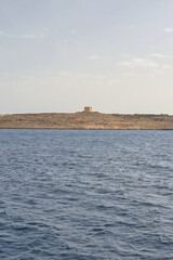 Gozo, Malta - JUNE 25, 2024:  The view onto the Gozo island from the sea. Fantastic views on a...