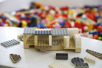 Fototapeta premium Toy house built with Star Wars-style Lego blocks on a playground