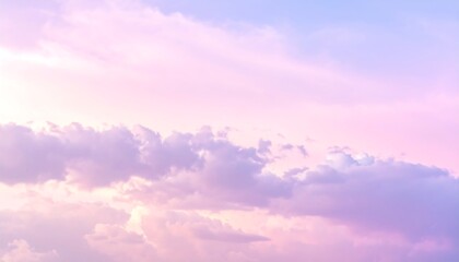 Soft pastel clouds float in a dreamy pink, purple, and blue sky, creating a serene background.
