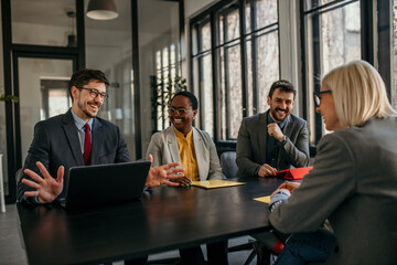 Business partners discussing business strategy in a meeting